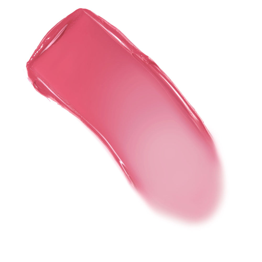 Verified shade swatch of ColourPop Lip and Cheek Balm, a glossy rose-pink smear that fades softly from vibrant berry to sheer blush, sweeping diagonally on a clean white background.