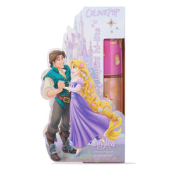 ColourPop Liquid Highlighter Mother Gothel shade displayed upright in a die-cut Disney Tangled box, featuring Rapunzel and Flynn Rider art, pink lantern-print cap, and a clear tube showing dewy, shimmery liquid highlighter.