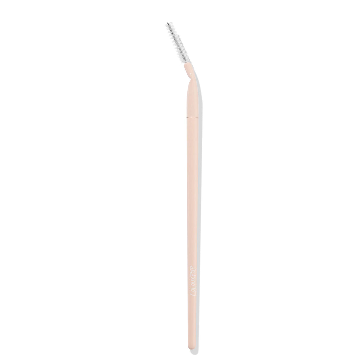 ColourPop Brow Brush makeup brush shaping brows with an angled spoolie head, featuring a blush‑pink handle and white spiral bristles; studio product shot on a clean white background.