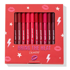 Ten ColourPop Lippie Pencil liners line up in the red Bring The Heat box, showing shades from pink and coral to crimson and burgundy; kiss, star, and lightning graphics decorate the packaging. 10-piece lip liner set, net wt 10 x 1.0 g (0.035 oz).